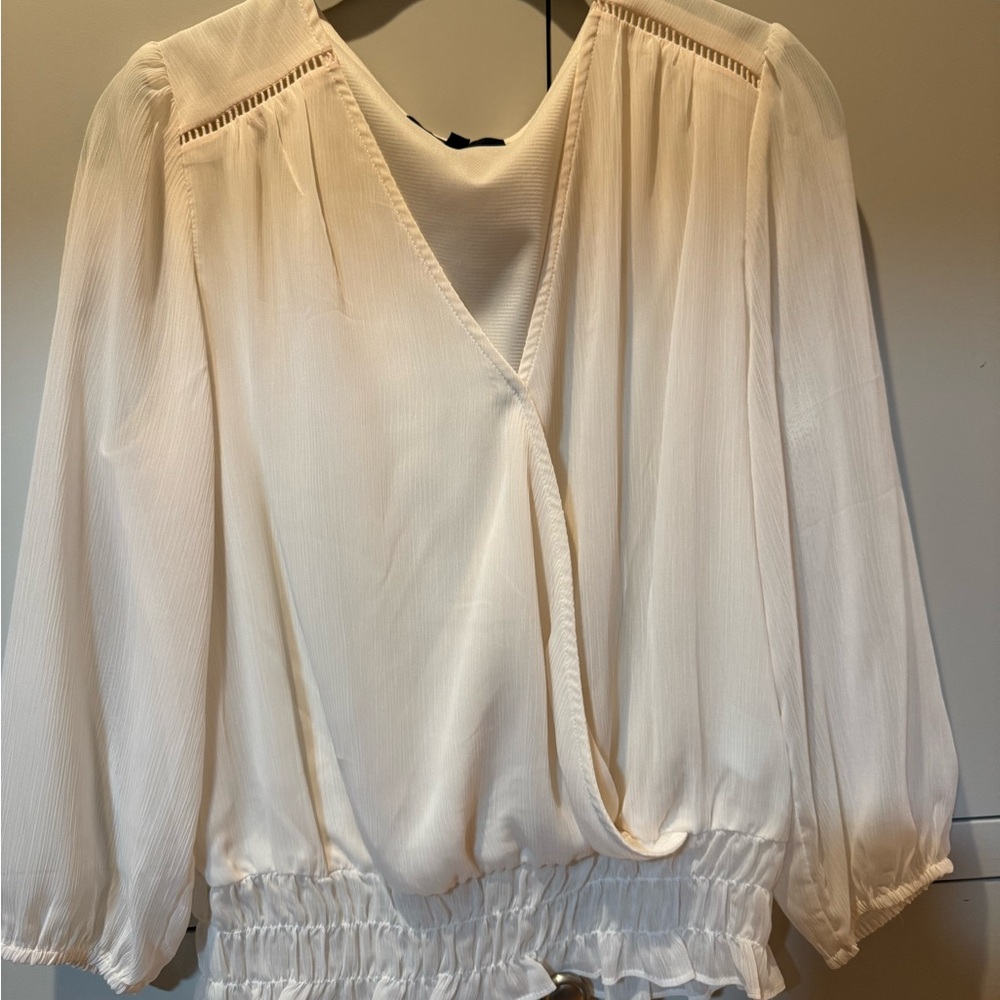 Cream Wrap Blouse with 3/4 Sleeves and Smocked Waist